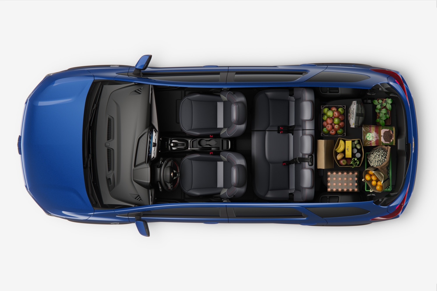 Visão superior da Chevrolet Spin 2026 com bagageiro carregado de compras, destacando a versatilidade do espaço.